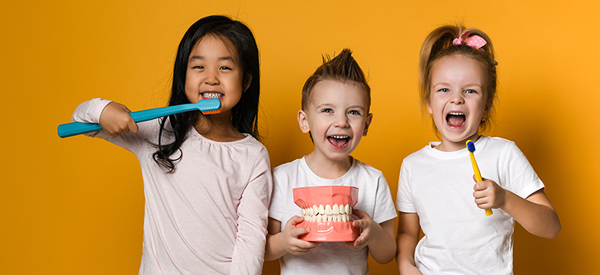 Children with toothbrushes