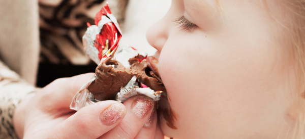 Child eating chocolate