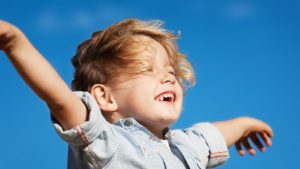 Child enjoying sun exposure