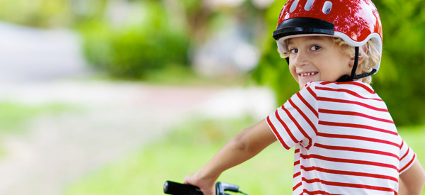 Happy boy on bike