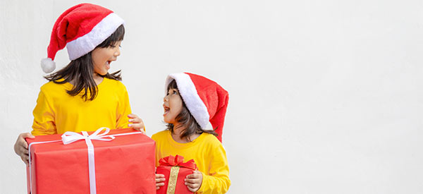 Children in Christmas hats