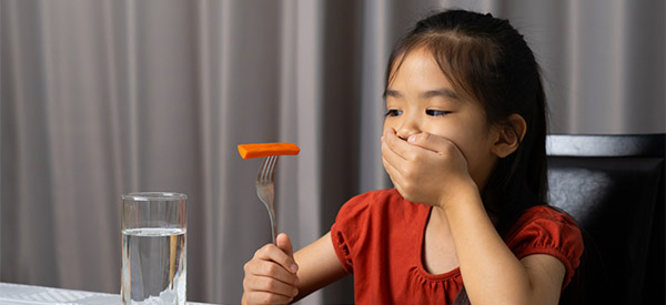 Girl being picky with food