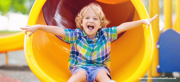 Boy playing on slide